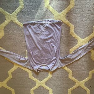 purple athletic shirt with strips